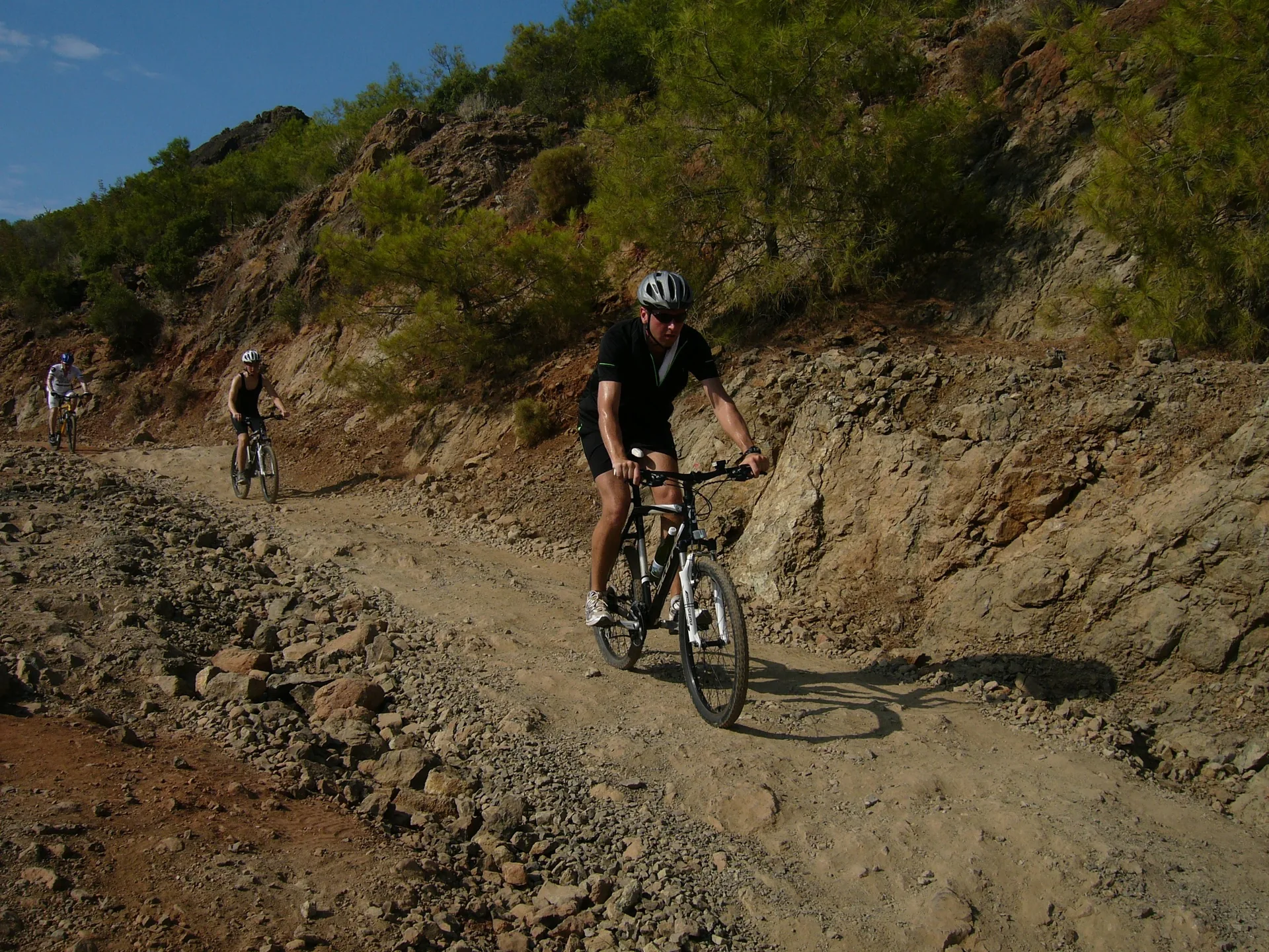 Mountain biker on a stony track