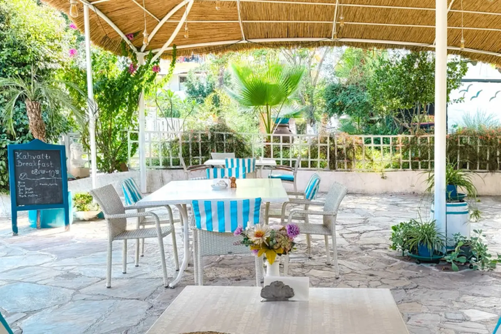 Breakfast table in the garden of the Erendiz Garden Hotel