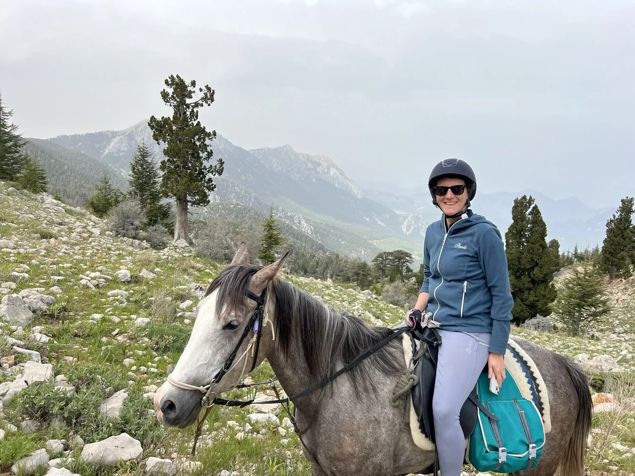 Rider and horse in the mountain landscape near Kemer